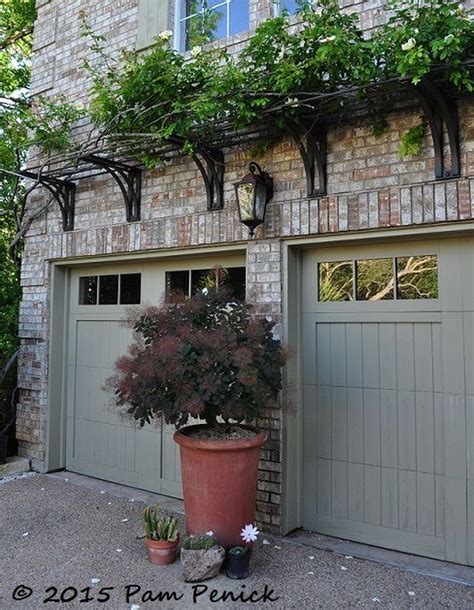 over the door metal trellis inside house|awnings over garage doors.